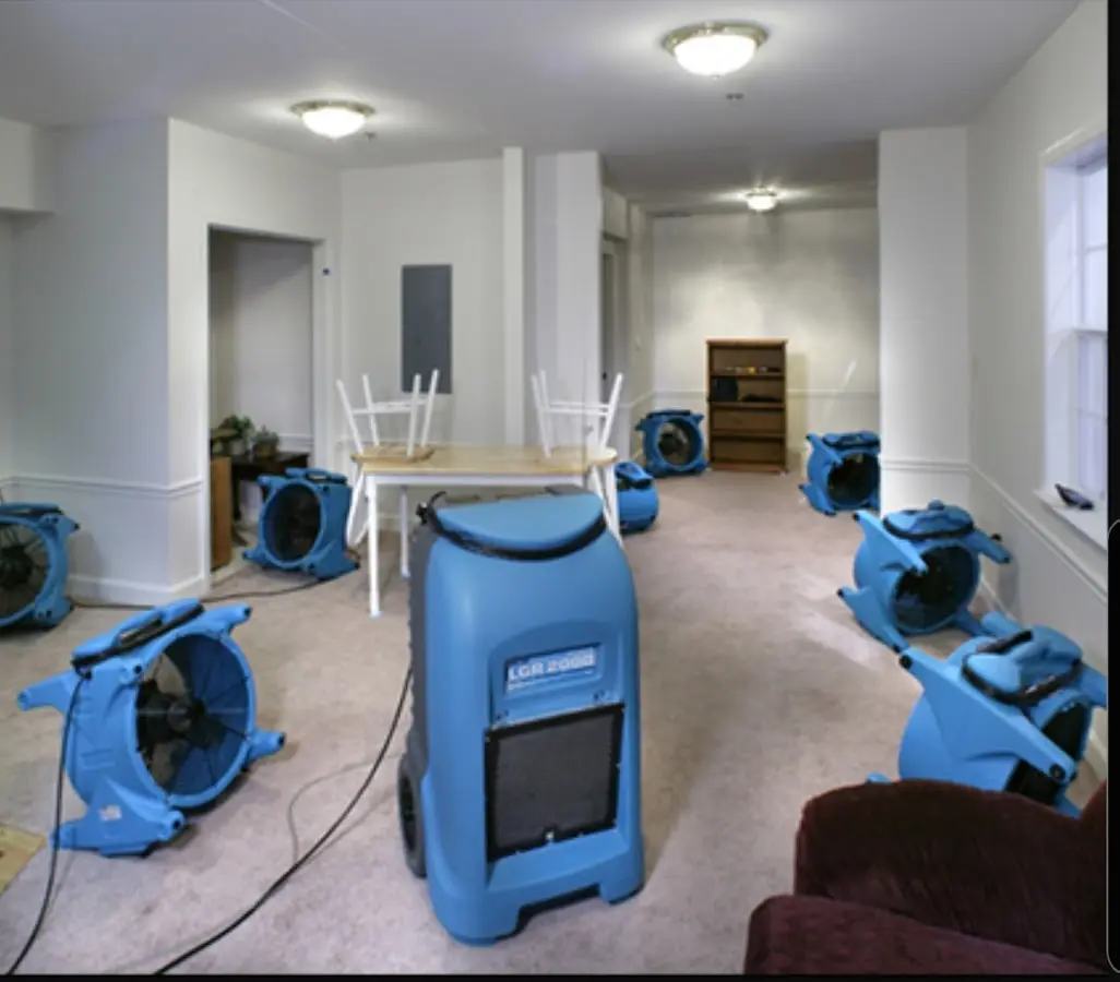 Air movers and dehumidifier setup for Water Extraction & Removal in Stamford